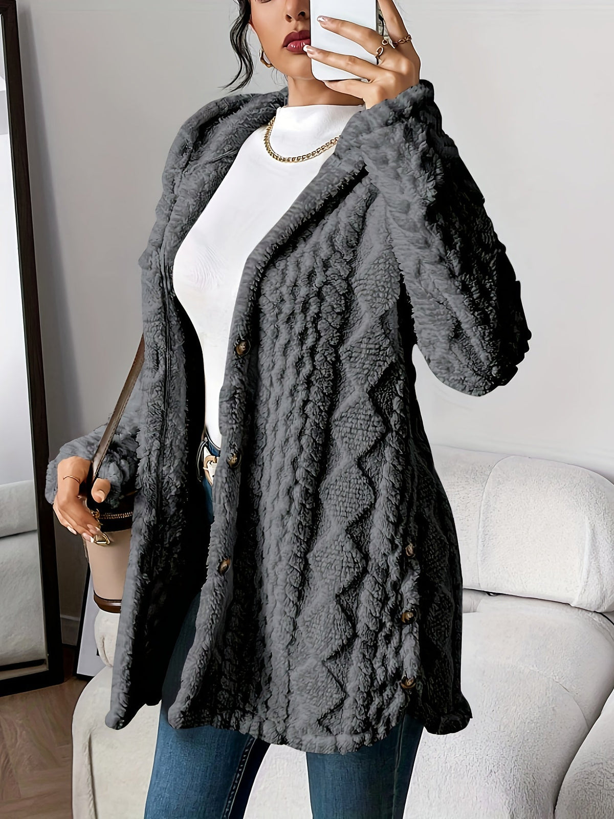 Women's hooded textured cardigan with long sleeves and button front