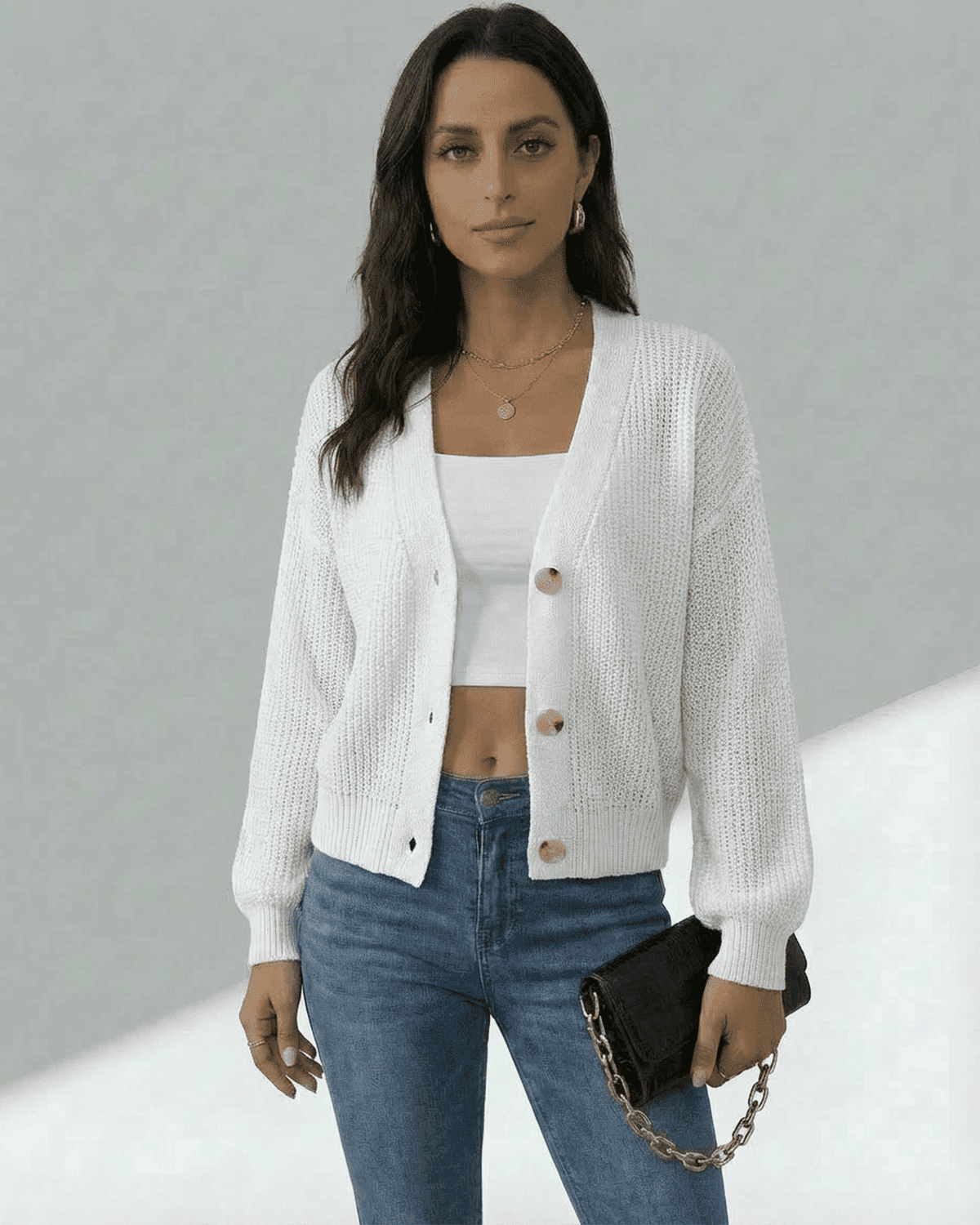 Women's white textured knit cardigan with long sleeves and button front