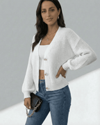 Women's white textured knit cardigan with long sleeves and button front