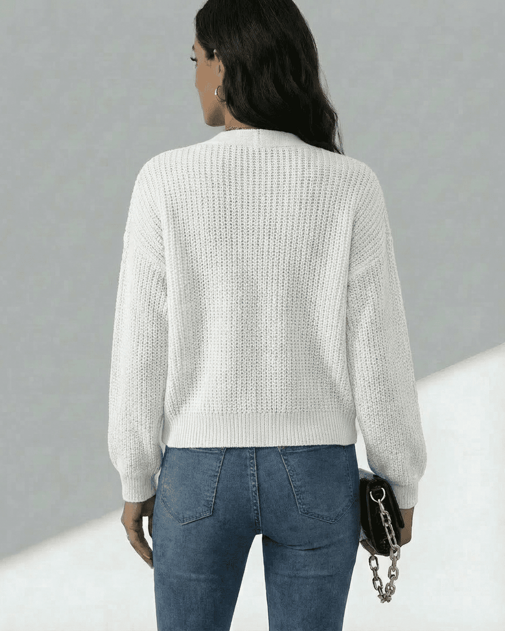 Women's white textured knit cardigan with long sleeves and button front