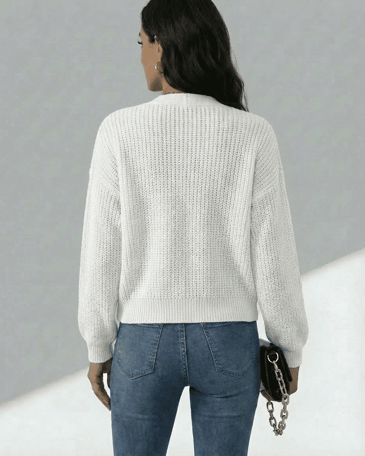 Women's white textured knit cardigan with long sleeves and button front
