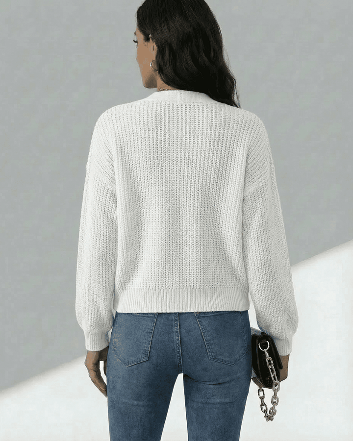 Women's white textured knit cardigan with long sleeves and button front