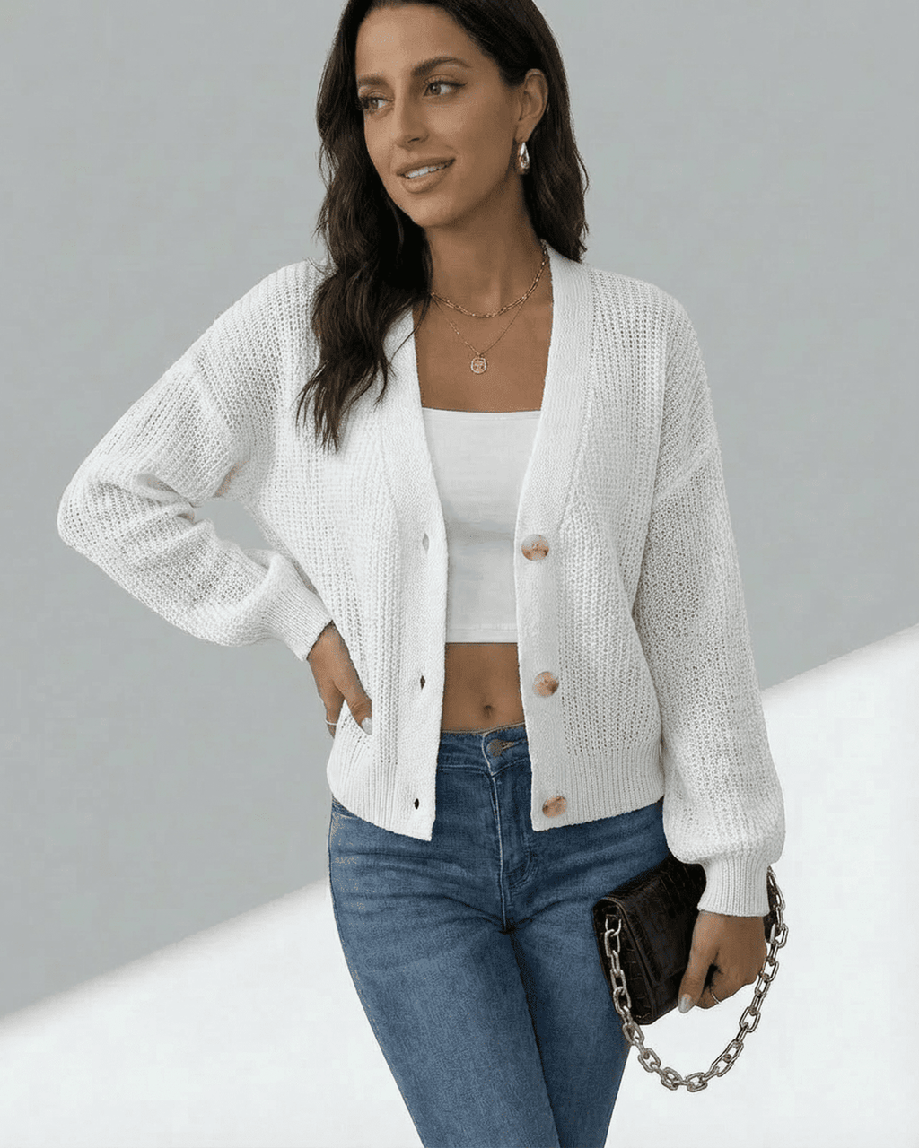 Women's white textured knit cardigan with long sleeves and button front