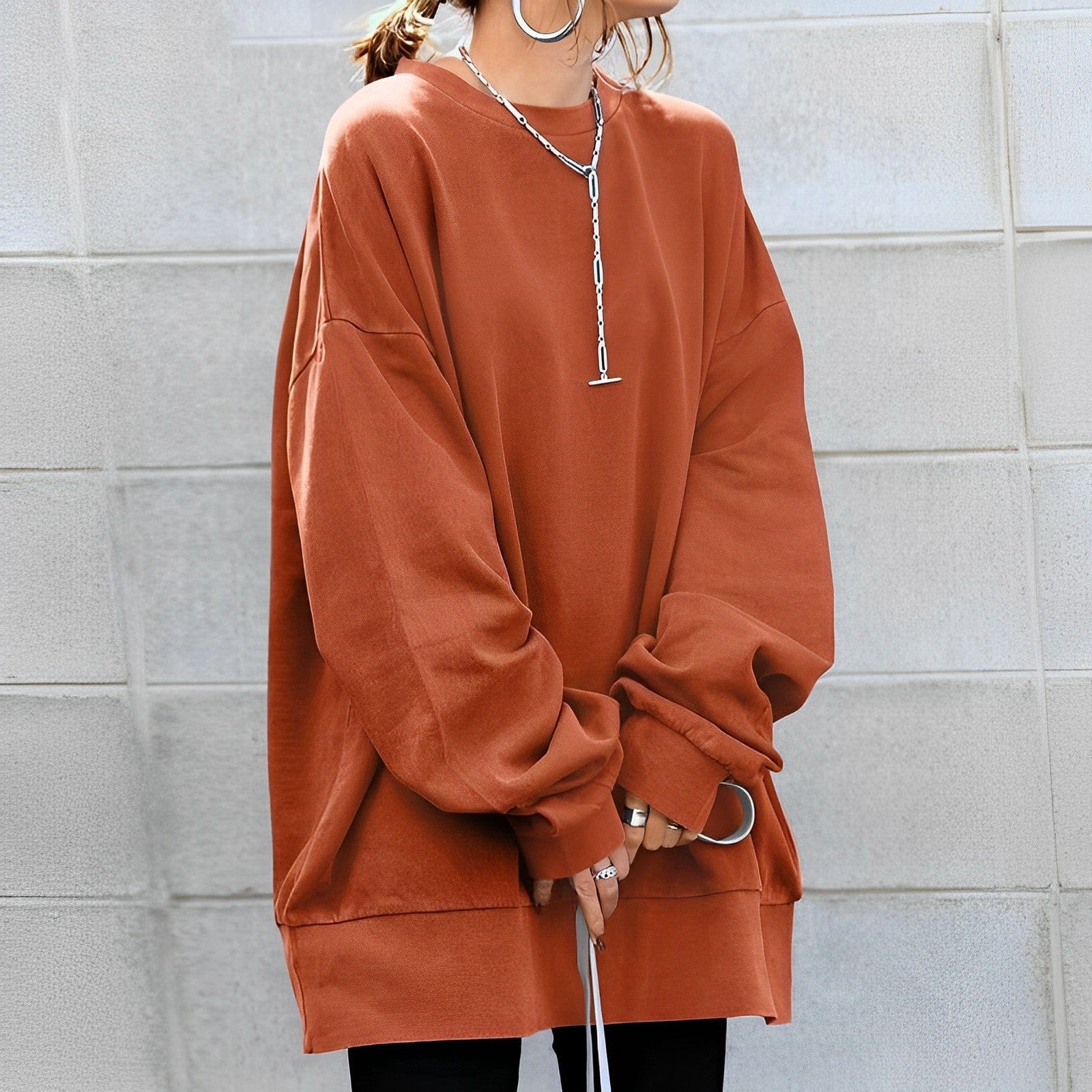 Women's oversized crew neck sweater with long sleeves and ribbed trims