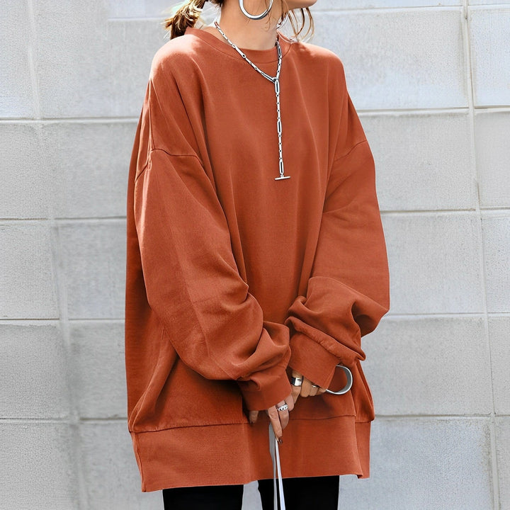 Women's oversized crew neck sweater with long sleeves and ribbed trims