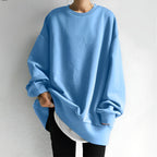 Women's oversized crew neck sweater with long sleeves and ribbed trims
