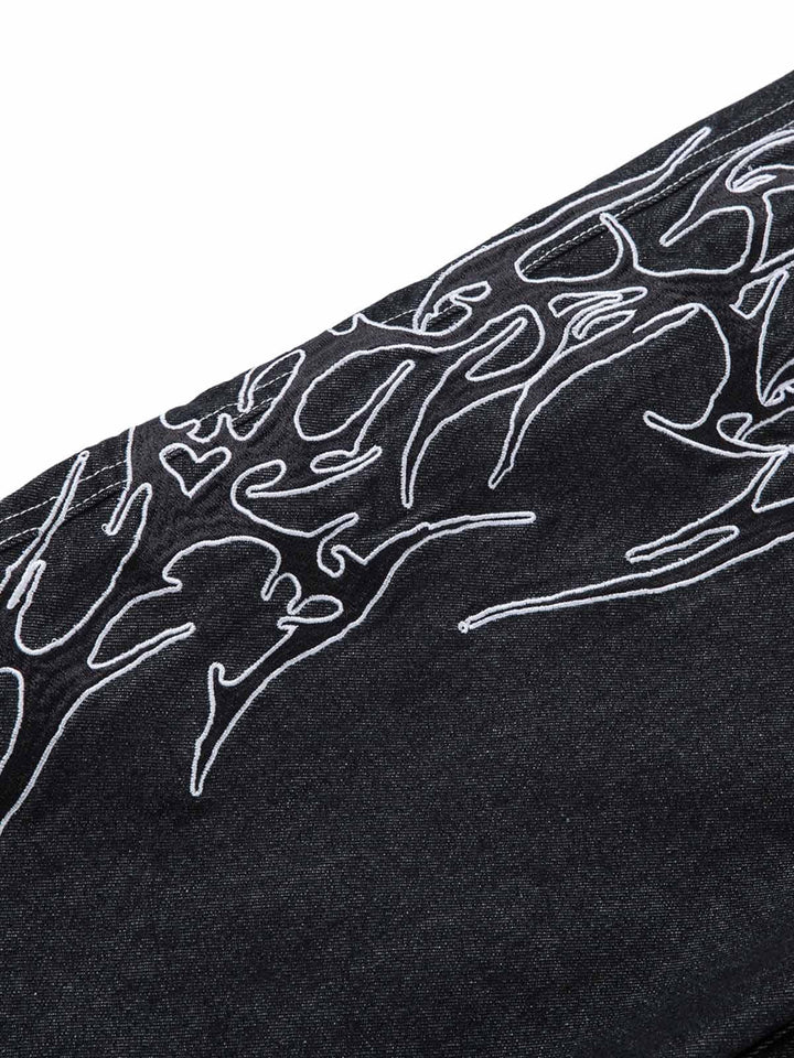Men's black wide-leg jeans with white flame embroidery