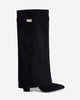Black knee-high boots with pointed toes, buckle straps and low heels