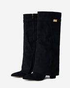 Black knee-high boots with pointed toes, buckle straps and low heels