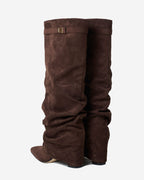 Women's brown slouchy knee-high boots with pointed toes
