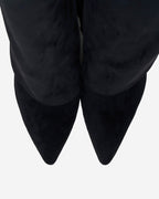 Black knee-high boots with pointed toes, buckle straps and low heels