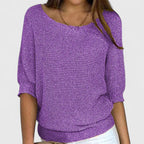 Women's textured knit pullover with round neckline and three-quarter sleeves