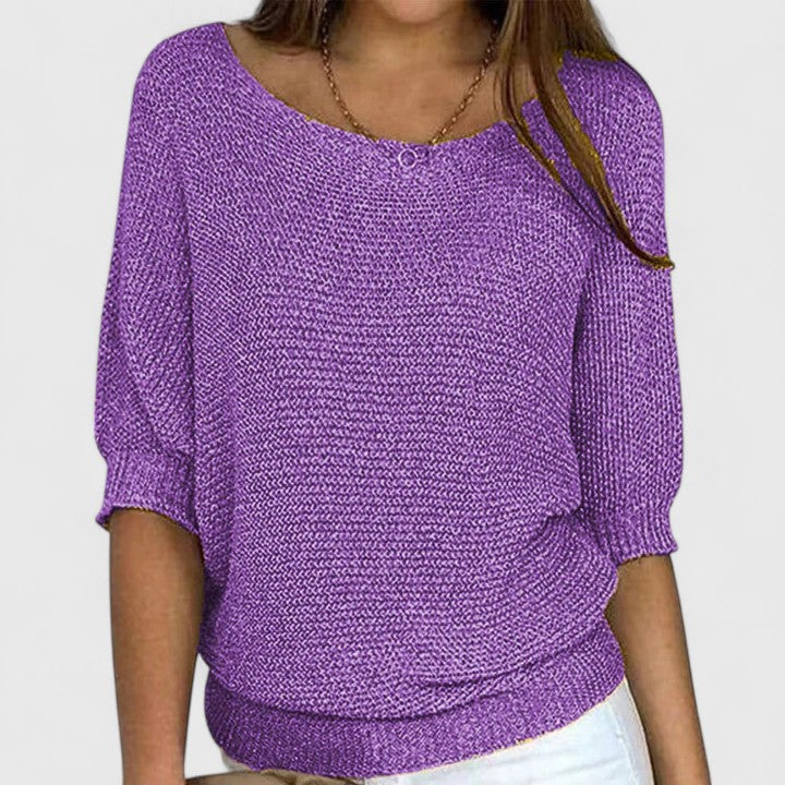 Women's textured knit pullover with round neckline and three-quarter sleeves