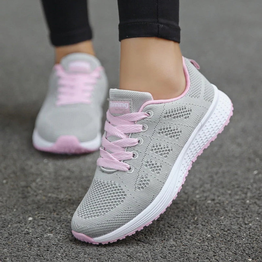 Women's low top lace-up sneakers with textured upper