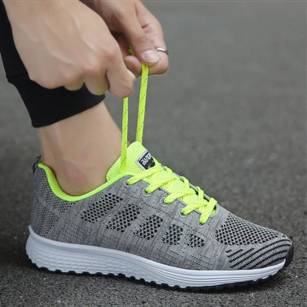 Women's low top lace-up sneakers with textured upper