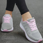 Women's low top lace-up sneakers with textured upper