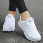 Women's low top lace-up sneakers with textured upper