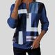 Women's geometric print sweatshirt with quarter zipper and long sleeves