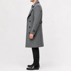 Men's long double-breasted trench coat with wide lapels and buttoned cuffs