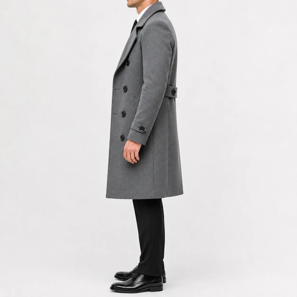 Men's long double-breasted trench coat with wide lapels and buttoned cuffs