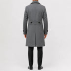 Men's long double-breasted trench coat with wide lapels and buttoned cuffs