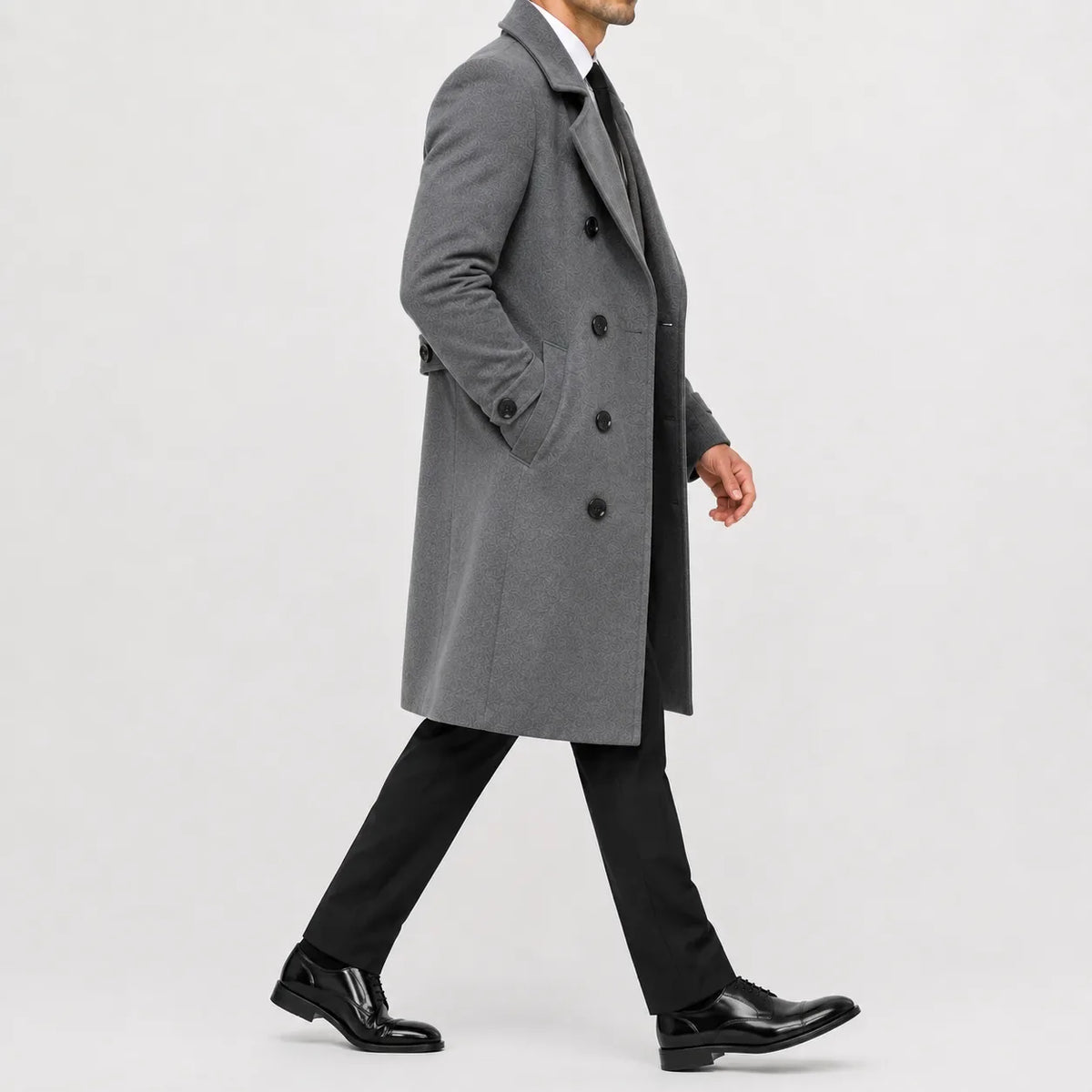 Men's long double-breasted trench coat with wide lapels and buttoned cuffs