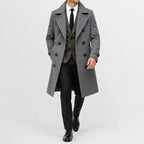 Men's long double-breasted trench coat with wide lapels and buttoned cuffs