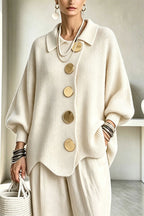 Women's oversized ribbed cardigan with collared neckline, balloon sleeves and large front buttons
