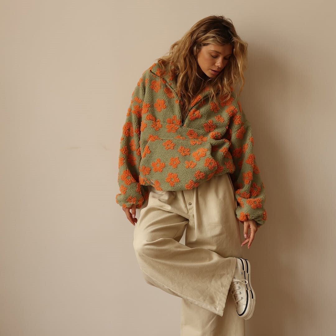 Women's floral half-zip pullover with stand collar and long sleeves