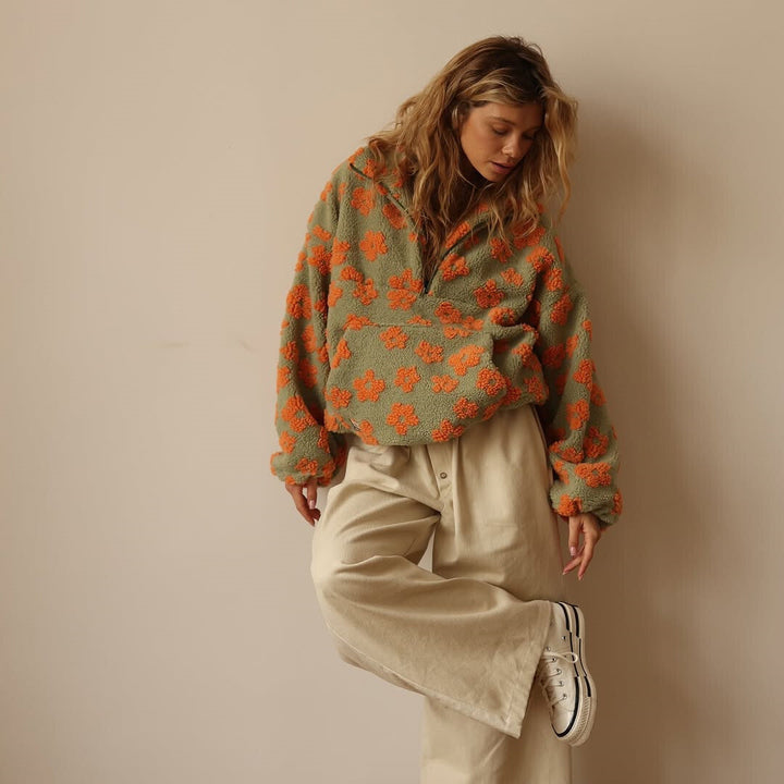 Women's floral half-zip pullover with stand collar and long sleeves