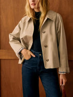 Women's beige cropped trench jacket with checked cuffs