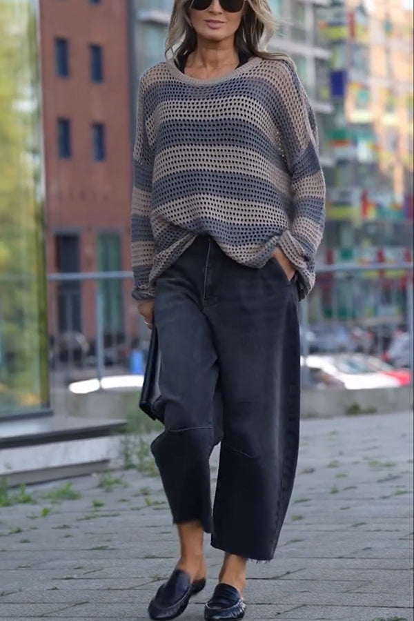 Women's striped open-knit sweater with crew neckline and long sleeves