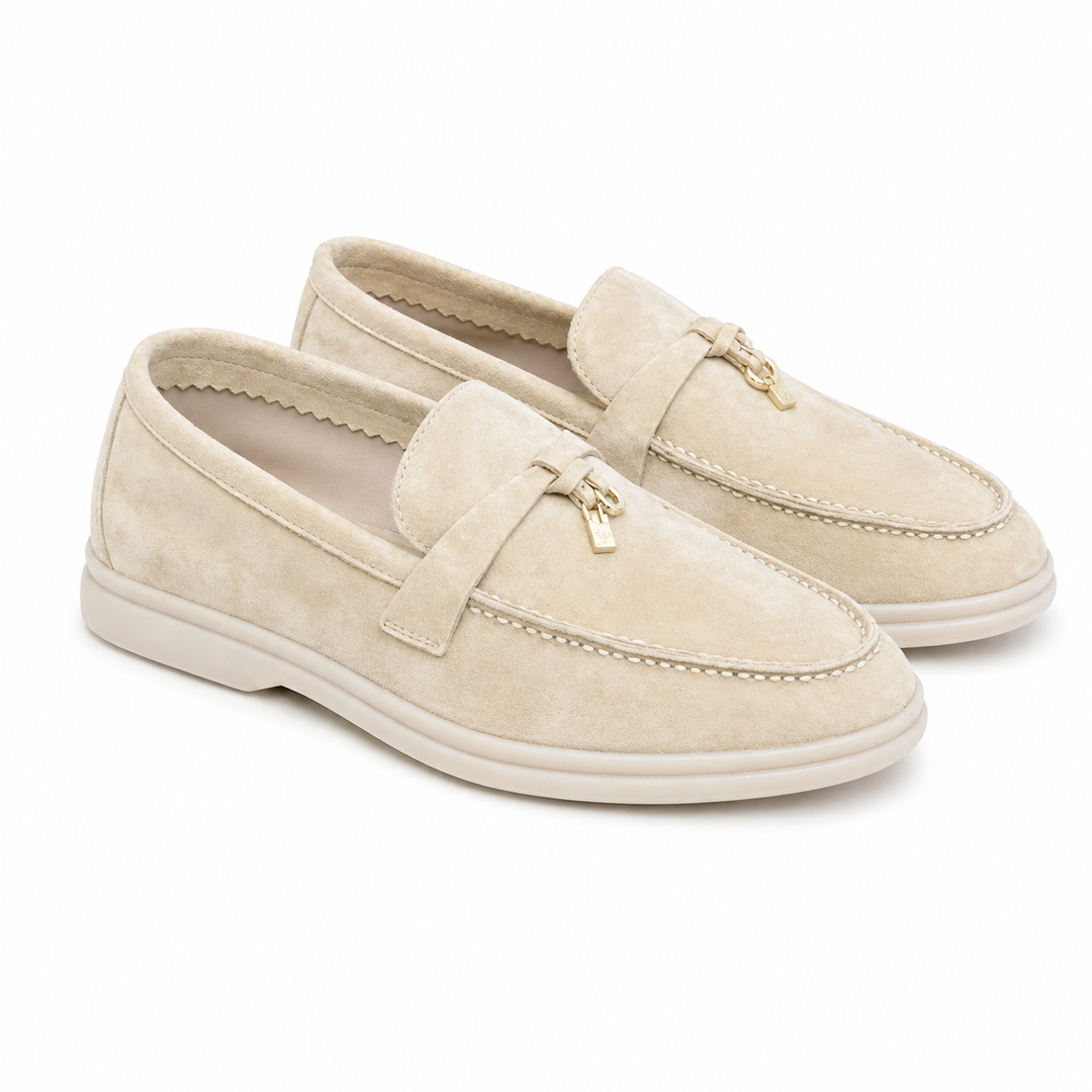 Women's plain loafers with moc toe stitching and decorative bit detail