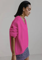 Women's oversized V-neck sweater with long sleeves and ribbed trims