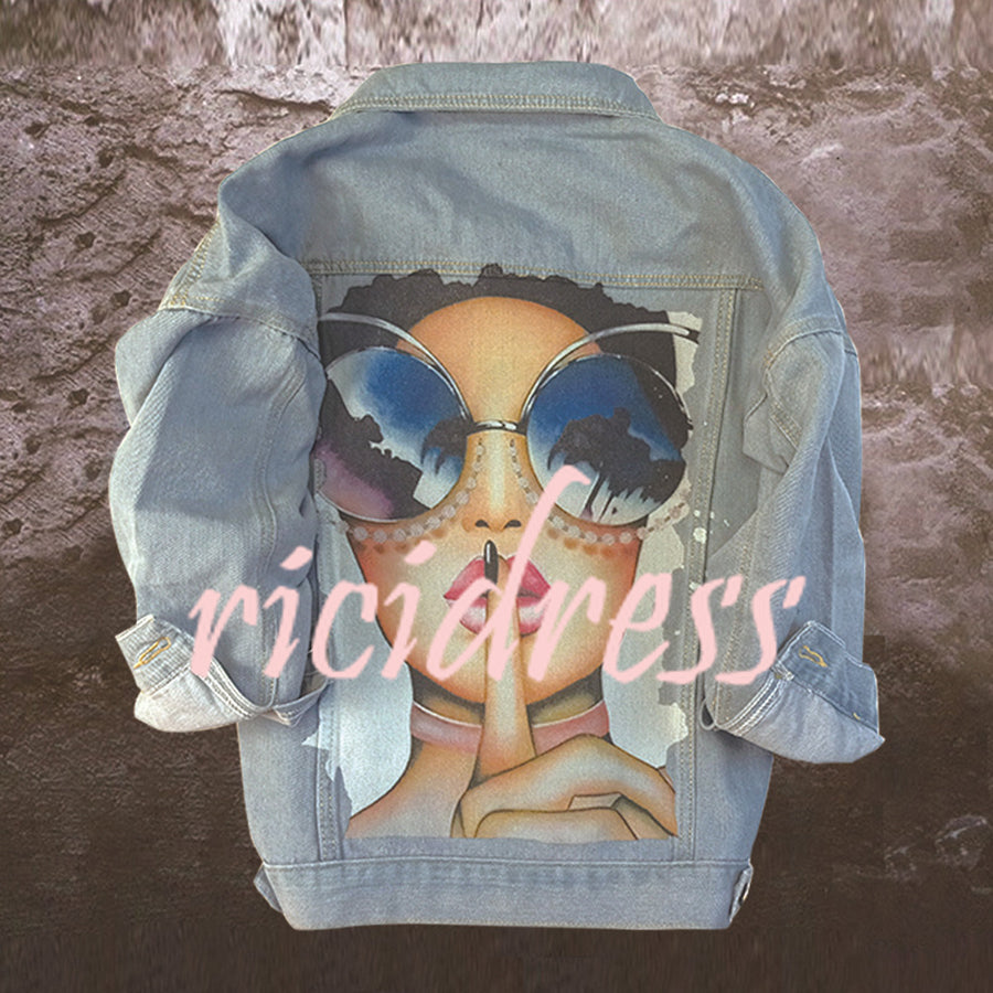 Women's printed denim jacket with portrait graphic and distressed details