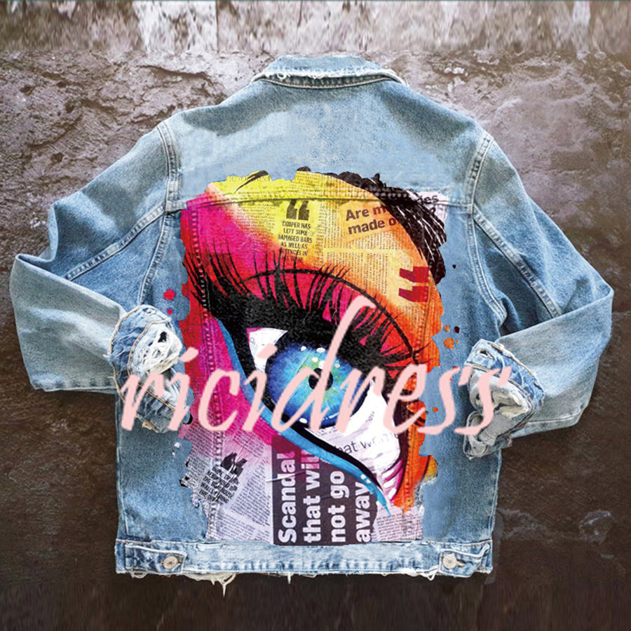 Women's denim jacket with colourful graphic eye print on the back