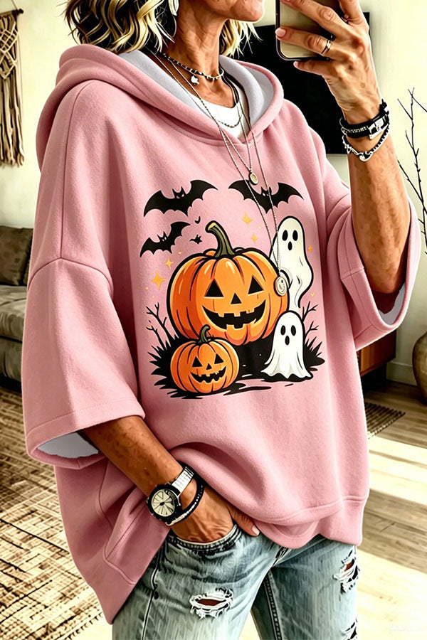Women's oversized hooded top with pumpkin, bat and ghost Halloween graphic