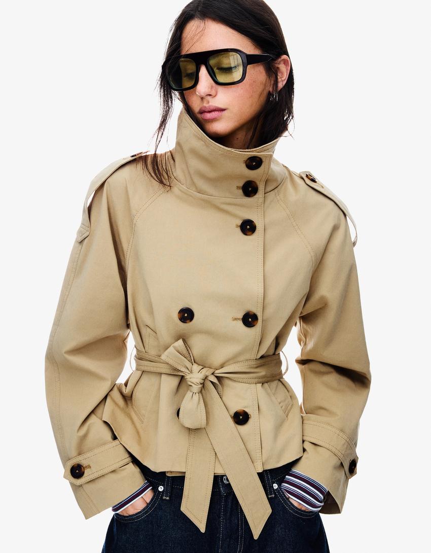 Women's belted trench jacket with high collar, long sleeves and front buttons