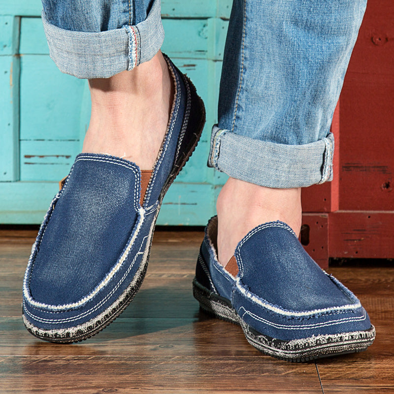 Unisex canvas loafer with moc toe, contrast stitching and flat sole