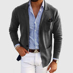 Men's tailored blazer with notched lapels, long sleeves, buttons and patch pockets