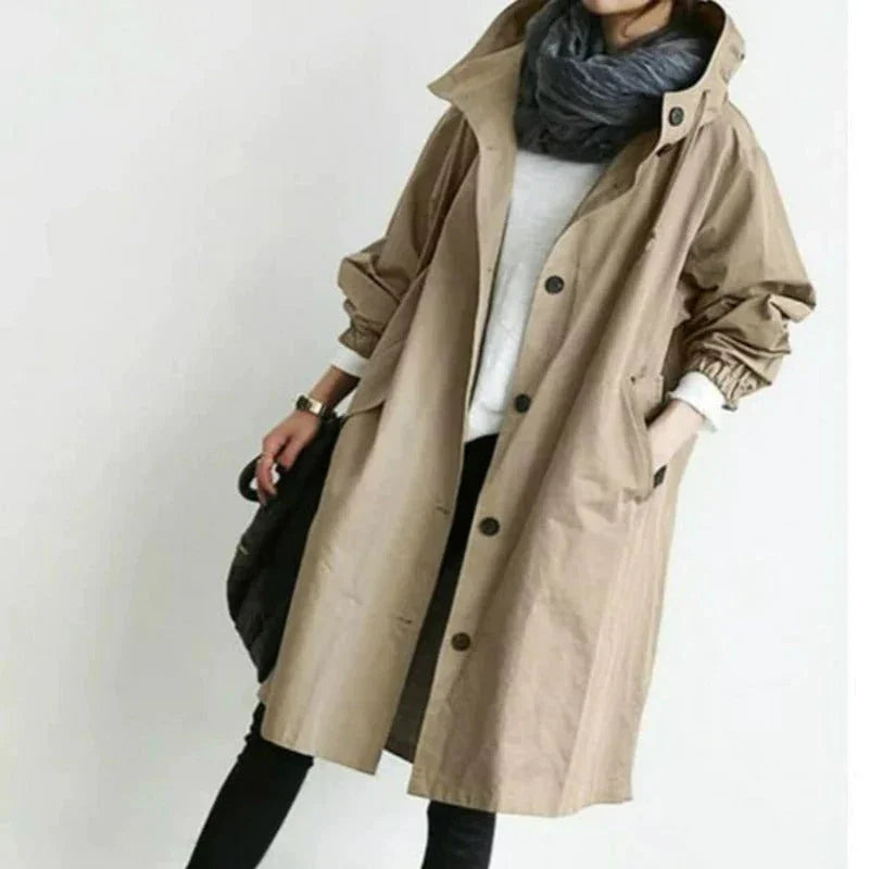 Women's hooded trench coat with button front and angled pockets