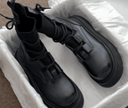 Women's lace-up ankle boots with round toes and treaded soles