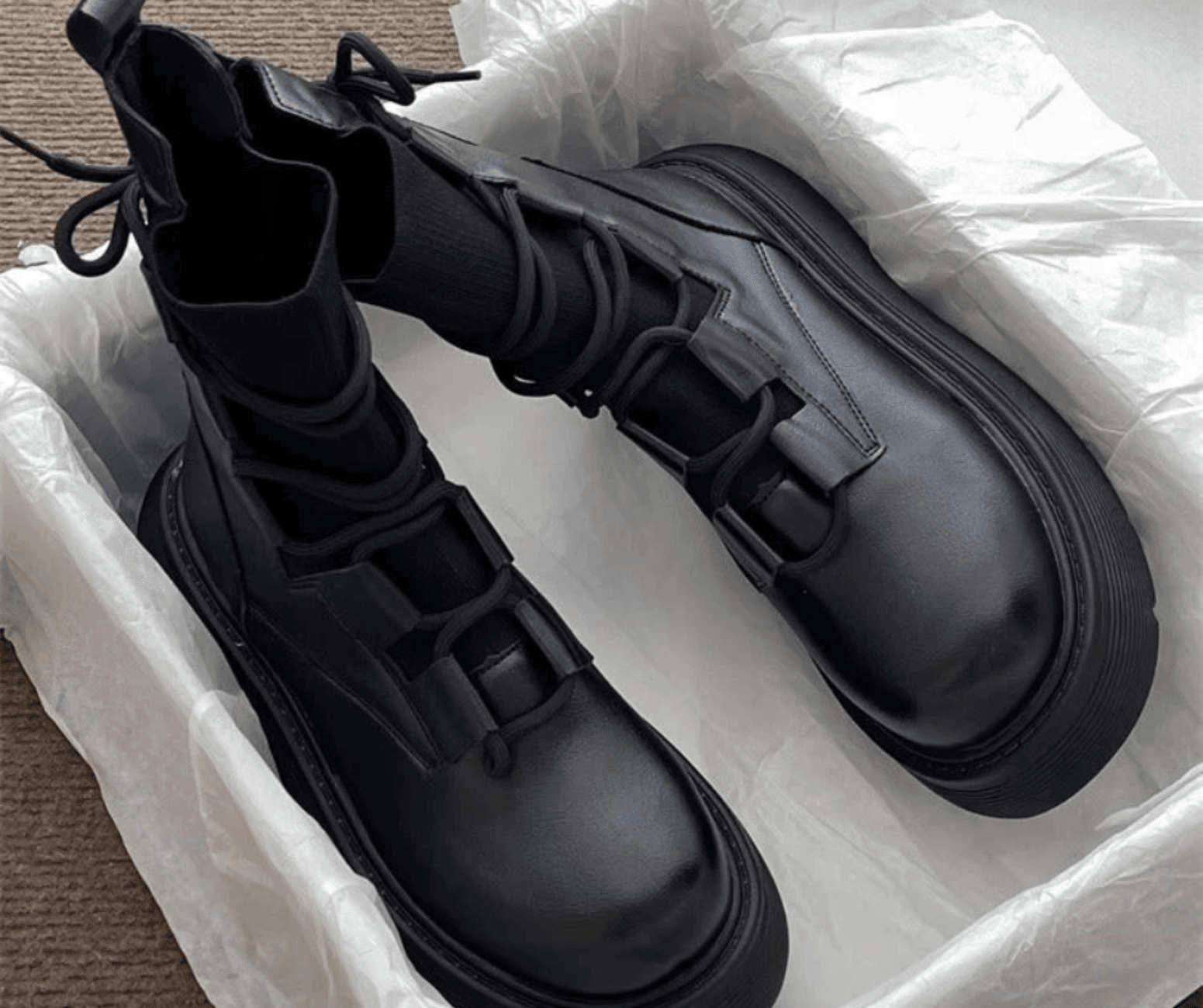 Women's lace-up ankle boots with round toes and treaded soles