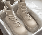 Women's lace-up ankle boots with round toes and treaded soles