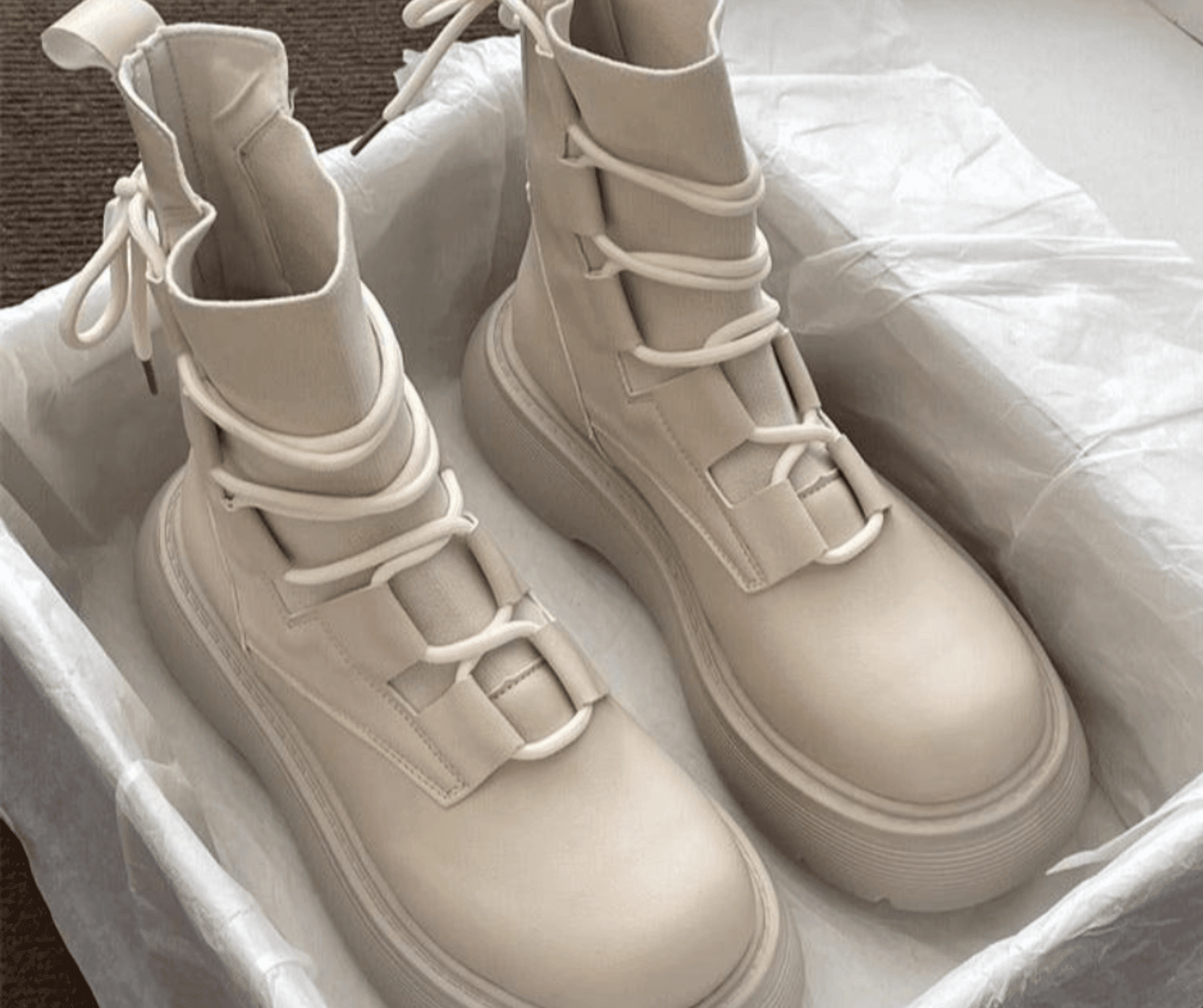 Women's lace-up ankle boots with round toes and treaded soles