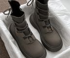 Women's lace-up ankle boots with round toes and treaded soles
