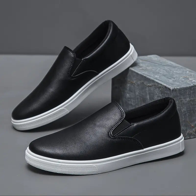 Men's slip-on loafers with rounded toes and contrasting white soles