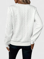 Women's textured quarter-zip sweater with long sleeves and ribbed trims