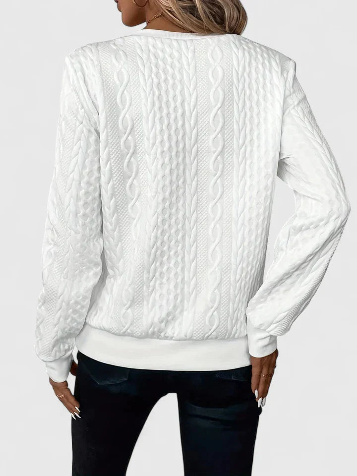 Women's textured quarter-zip sweater with long sleeves and ribbed trims