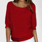 Women's textured knit pullover with round neckline and three-quarter sleeves